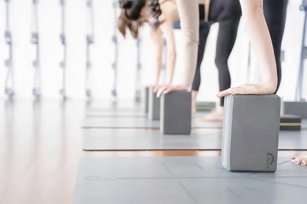 recommended products from danielle sethi- group yoga using yoga blocks
